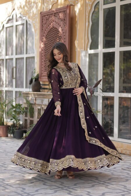 Women's Luxurious Plum Velvet Anarkali Gown with Heavy Gold Zari & Sequin Embroidery – Perfect for Weddings & Grand Festivities